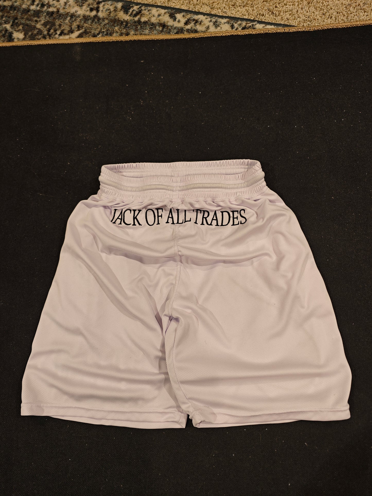 "JACK OF ALL TRADES" OVERSIZED MESH SHORTS